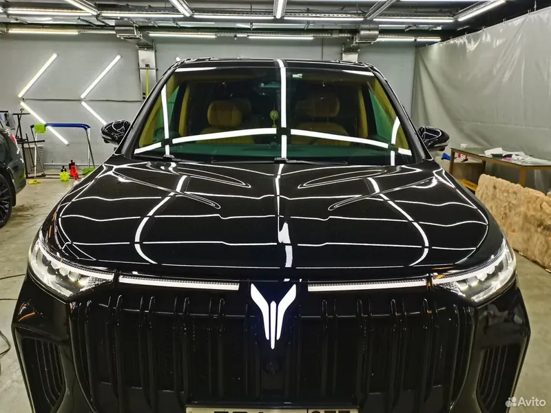 Фотография чёрного автомобиля после работ
